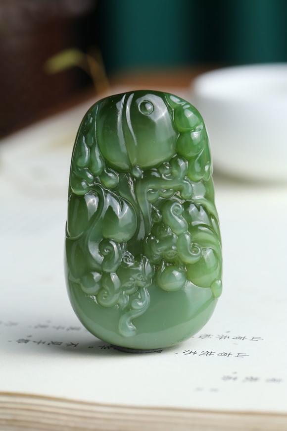北京唐潮拍賣有限公司扭轉(zhuǎn)乾坤精品和田玉碧玉貓眼掛件