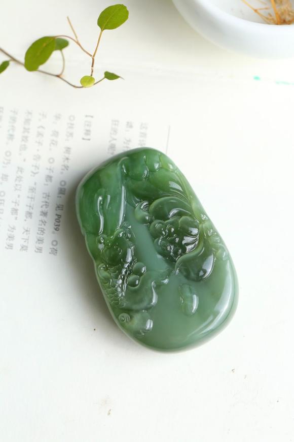 北京唐潮拍賣有限公司扭轉(zhuǎn)乾坤精品和田玉碧玉貓眼掛件