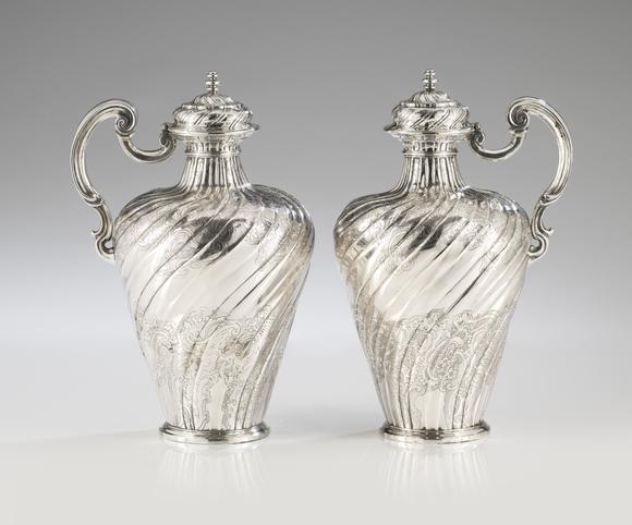 VERITAS Art AuctioneersA pair of Portuguese silver ewers