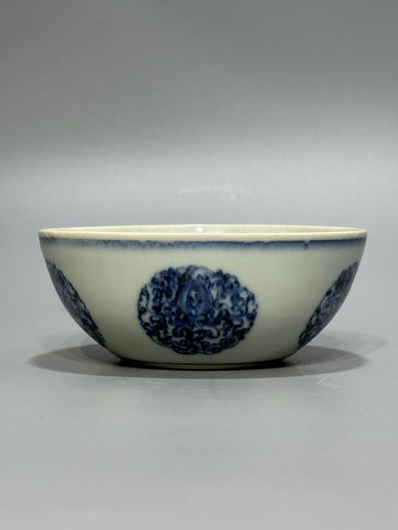 SEAVIEW AUCTIONS PTY LTDA Blue and White Bowl with Circular Floral Treasure Medallions, China, 18th century
