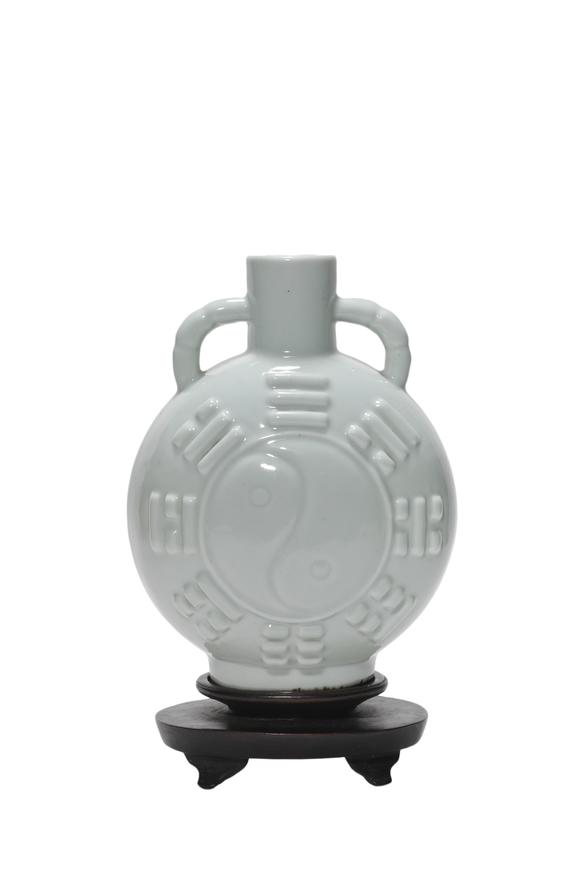 Castle AuctionA Light Celadon Bag Vase with Taiji Trigram Relief, 18th–19th C Pr.