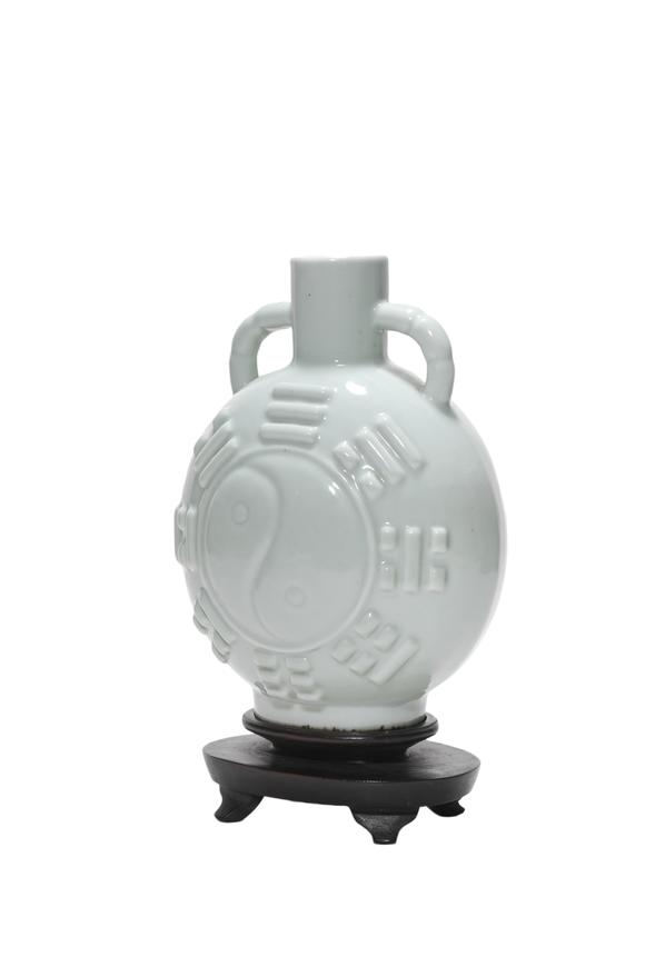 Castle AuctionA Light Celadon Bag Vase with Taiji Trigram Relief, 18th–19th C Pr.