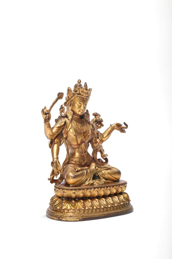 Castle AuctionA Gilt Bronze Four-Armed Manjushri Statue, 18th–19th C Pr.