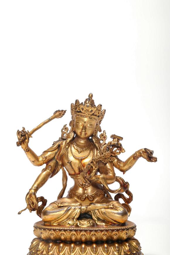 Castle AuctionA Gilt Bronze Four-Armed Manjushri Statue, 18th–19th C Pr.
