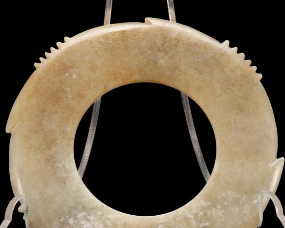 Castle AuctionA Calcified Pale Jade Notched Bi, Late Neolithic, Circa 3300–2300 C BC Pr.