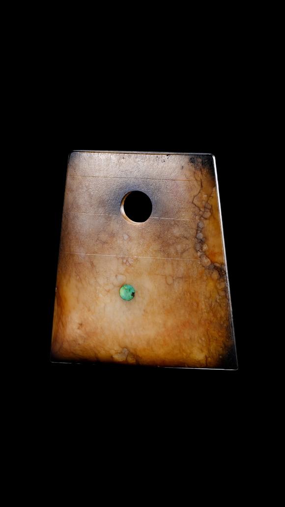 Castle AuctionA Calcified Brown Jade Axe Pendant with Turquoise Inlay, Neolithic, Circa 3300–2300 C BC Pr.