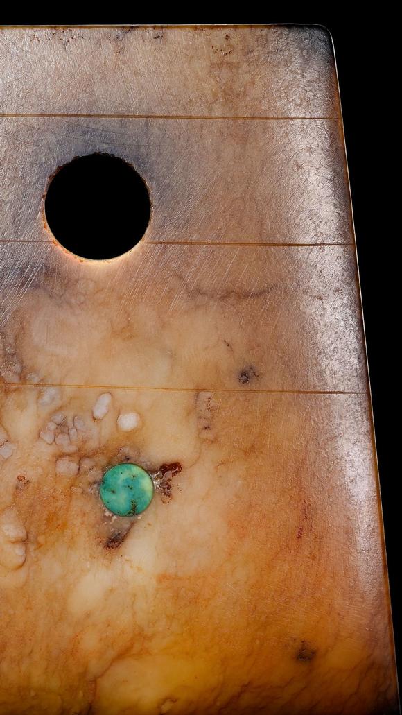 Castle AuctionA Calcified Brown Jade Axe Pendant with Turquoise Inlay, Neolithic, Circa 3300–2300 C BC Pr.