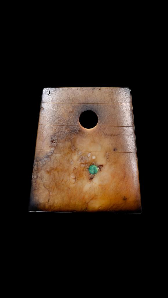 Castle AuctionA Calcified Brown Jade Axe Pendant with Turquoise Inlay, Neolithic, Circa 3300–2300 C BC Pr.