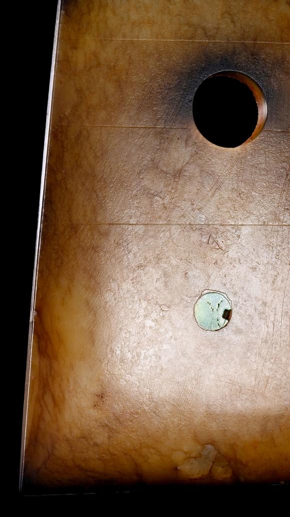 Castle AuctionA Calcified Brown Jade Axe Pendant with Turquoise Inlay, Neolithic, Circa 3300–2300 C BC Pr.