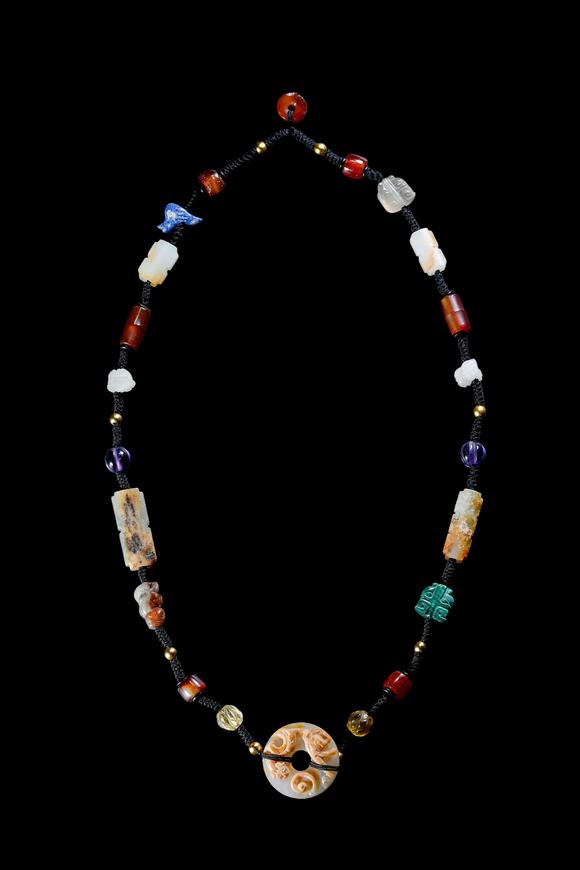 Castle AuctionA Multi-Coloured Hardstone Bead Necklace, Han, Circa 2nd C BC–2nd C AD Pr.