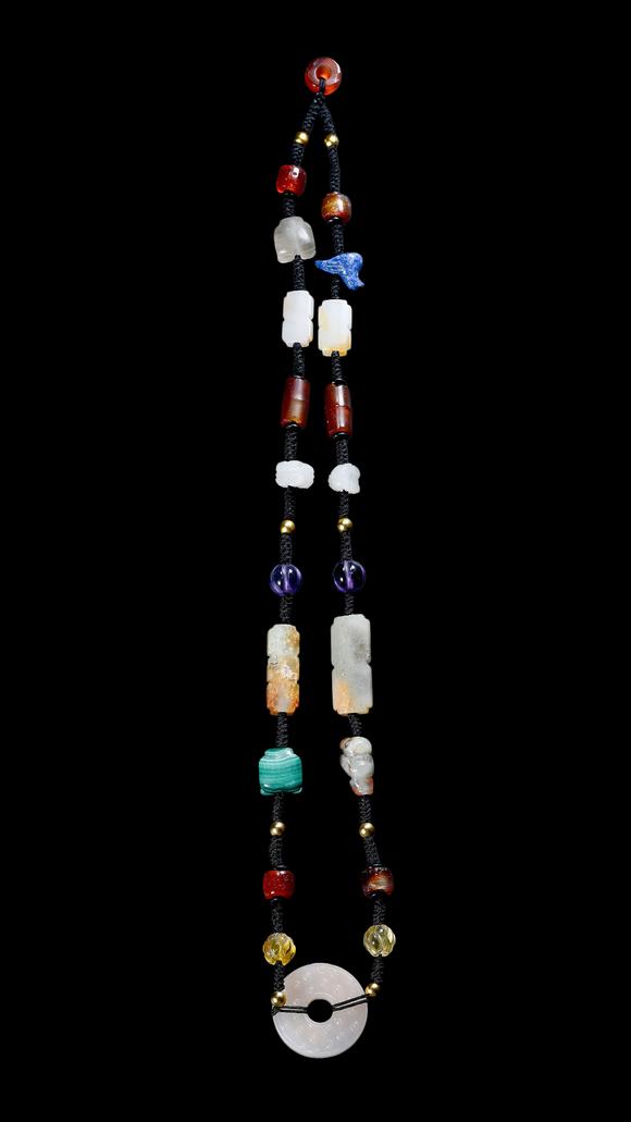 Castle AuctionA Multi-Coloured Hardstone Bead Necklace, Han, Circa 2nd C BC–2nd C AD Pr.