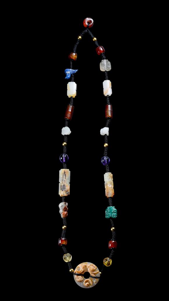 Castle AuctionA Multi-Coloured Hardstone Bead Necklace, Han, Circa 2nd C BC–2nd C AD Pr.