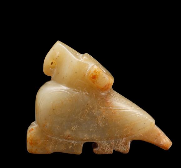Castle AuctionA Pale Calcified Jade Recumbent Bird Carving, Late Shang, Circa 12th–11th C BC Pr.