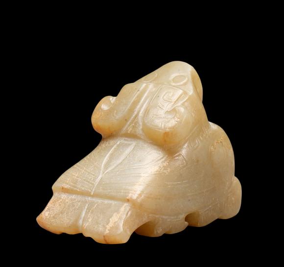 Castle AuctionA Pale Calcified Jade Recumbent Bird Carving, Late Shang, Circa 12th–11th C BC Pr.