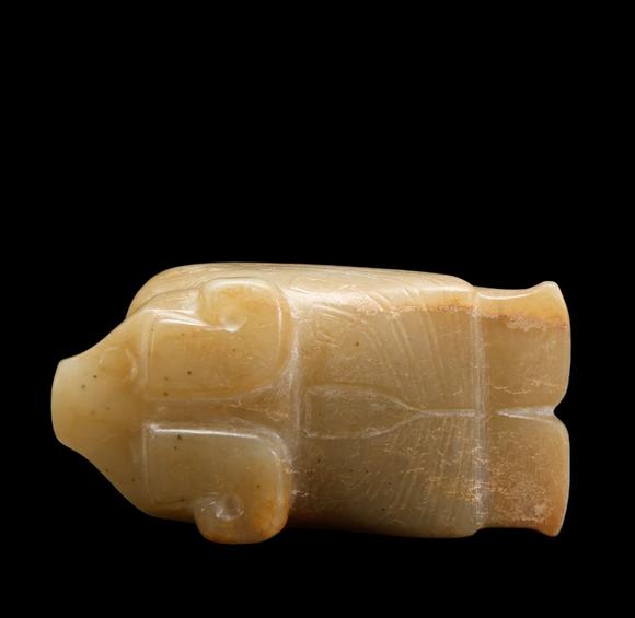 Castle AuctionA Pale Calcified Jade Recumbent Bird Carving, Late Shang, Circa 12th–11th C BC Pr.