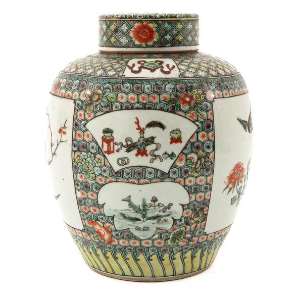 Castle AuctionA famille verte jar with cover