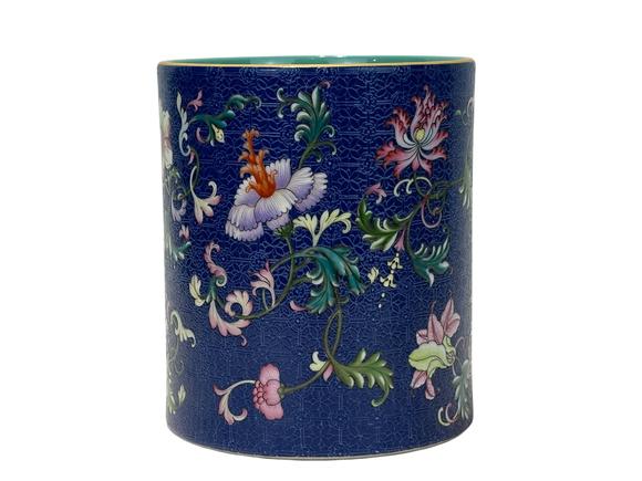 Castle AuctionBlue ground pastel with broken branch floral brush pot