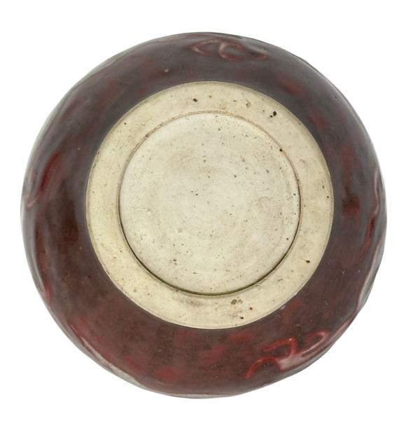 Castle AuctionThe underglaze red jar with hidden dragon pattern carvings, Ming Dynasty Pr. or earlier.