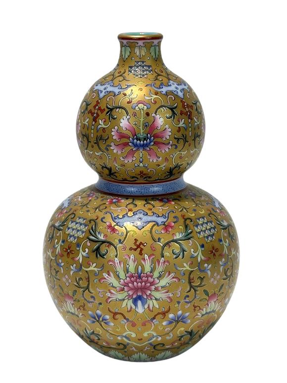 Castle AuctionA Chinese Famille Rose gilt gourd type vase, Qian Long Pr. 