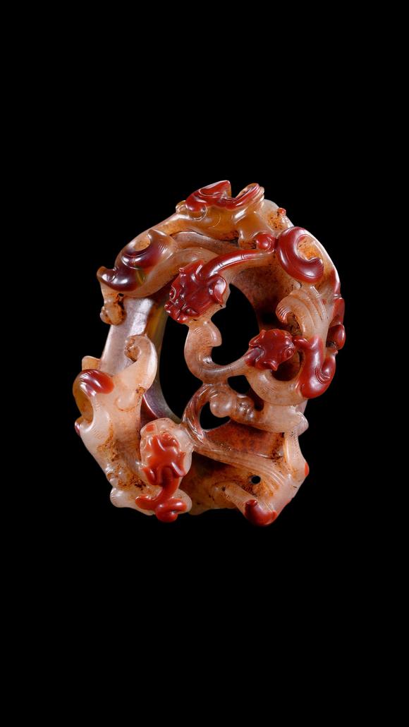 Castle AuctionA Red and Pale Jade Chilong Dragon Carving, Han, Circa 2nd C BC–2nd C AD Pr.