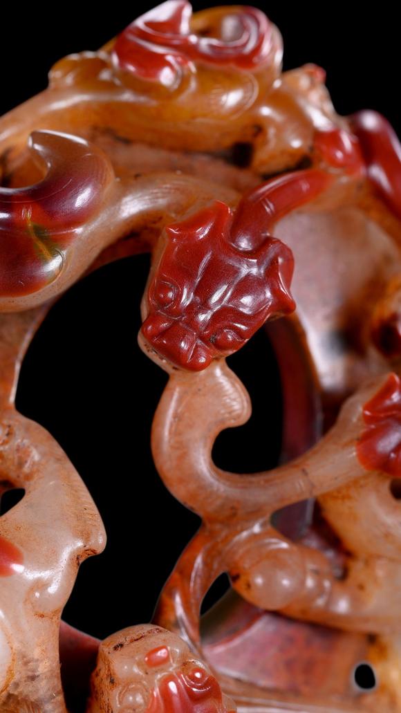 Castle AuctionA Red and Pale Jade Chilong Dragon Carving, Han, Circa 2nd C BC–2nd C AD Pr.