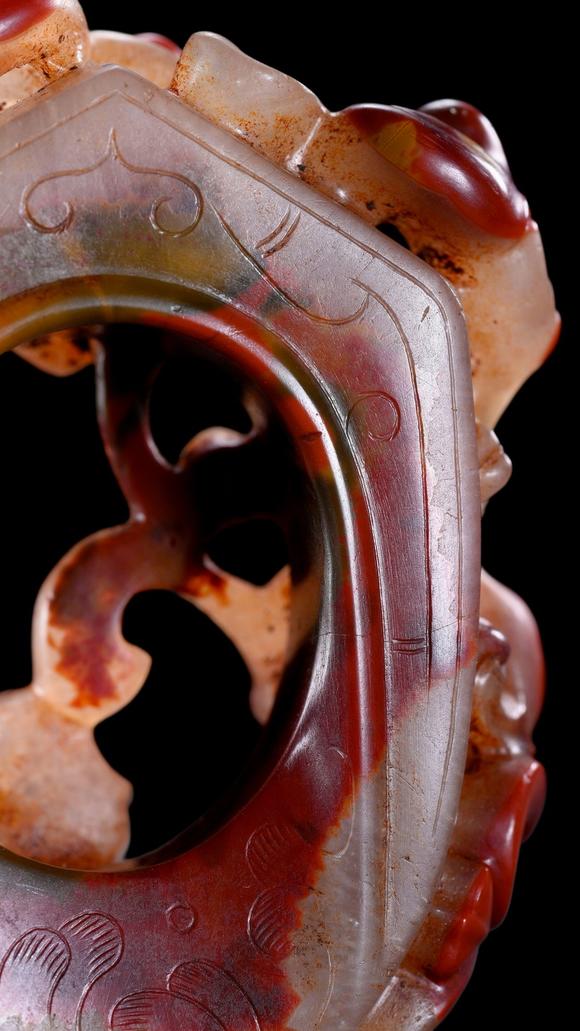 Castle AuctionA Red and Pale Jade Chilong Dragon Carving, Han, Circa 2nd C BC–2nd C AD Pr.
