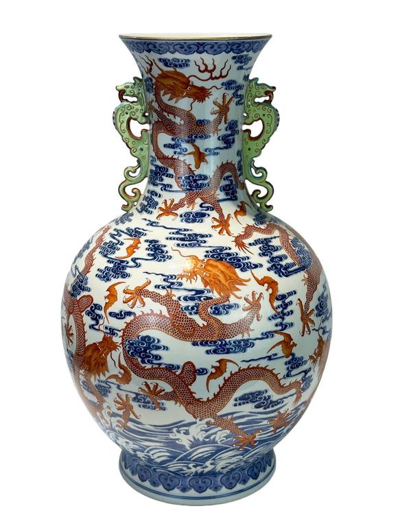 Castle AuctionAn extra large size of vase with double ears, and  cloud dragon patterns, Qian Long Pr. 