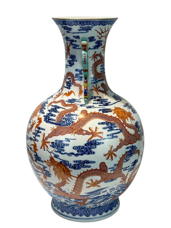 Castle AuctionAn extra large size of vase with double ears, and  cloud dragon patterns, Qian Long Pr. 