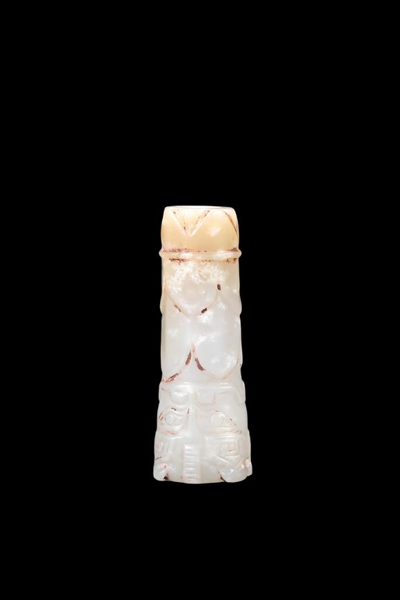 Castle AuctionA Pale Celadon Jade Taotie Tube Bead, Western Zhou, Circa 10th–9th C BC Pr.