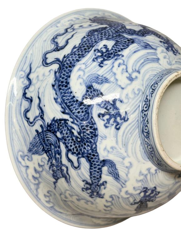 Castle AuctionA large Blue-and-white bowl decorated with sea-water dragon pattern, Ming Dynasty Pr. 