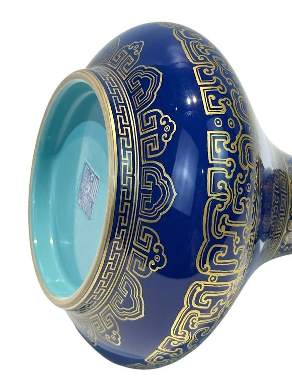 Castle AuctionA Chinese blue ground vase with gilt dragon pattern, Qian Long Pr. 