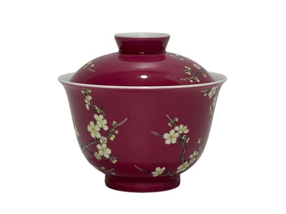 Castle AuctionA rouge-red ground bowl decorated with plum blossom pattern, and with cover, Qing Dynasty Pr. 
