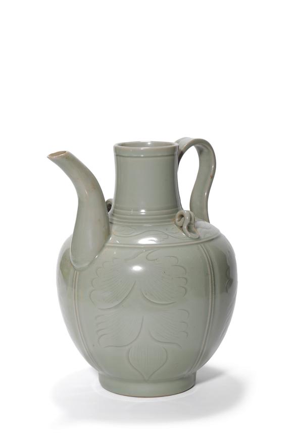 Castle AuctionA Longquan Celadon Carved Floral Ewer, 13th–14th C Pr.