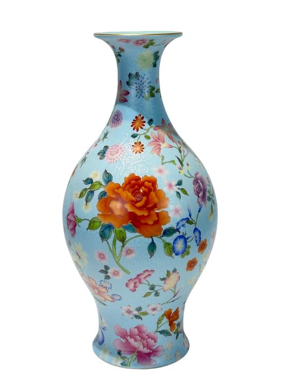 Castle AuctionA Chinese blue-ground Famille Rose vase, Qian Long Pr. 