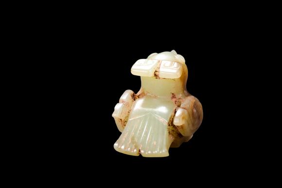 Castle AuctionA Pale Yellow Jade Recumbent Bird Carving, Late Shang, Circa 12th–11th C BC Pr.