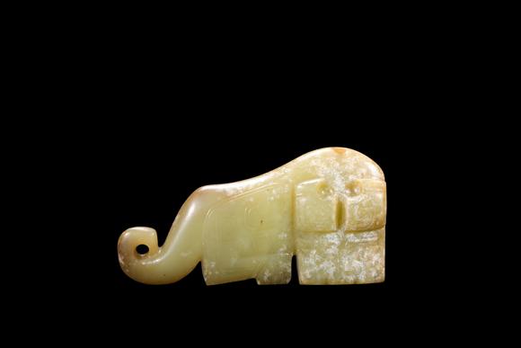 Castle AuctionA Pale Calcified Jade Elephant Pendant, Late Shang, Circa 12th–11th C BC Pr.