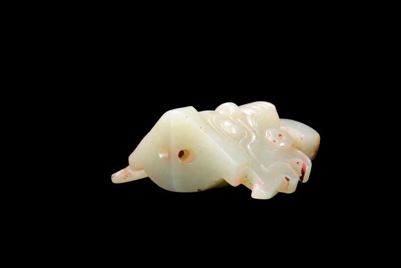 Castle AuctionA Pale Celadon Jade Taotie Mask Pendant, Shang, Circa 13th–11th C BC Pr.