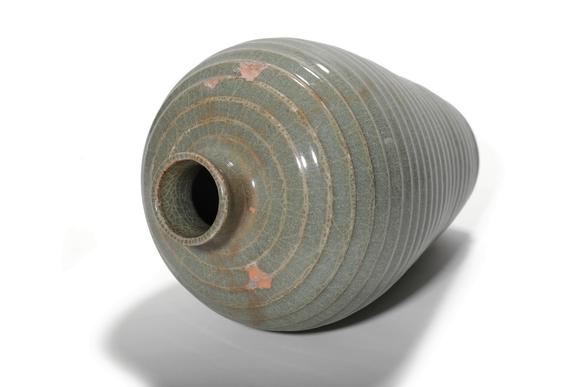 Castle AuctionA Longquan Celadon Ribbed Meiping Vase, 13th–14th C Pr.