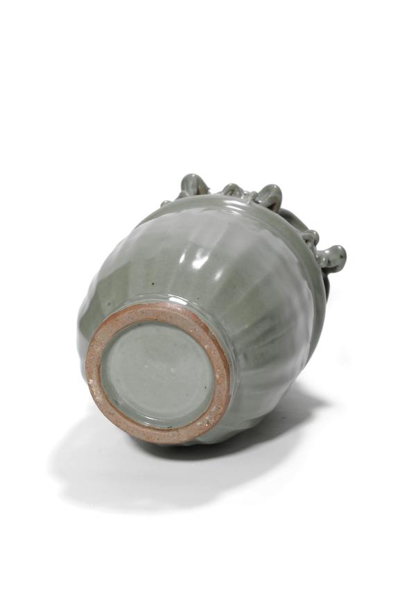 Castle AuctionA Longquan Celadon Dragon Relief Vase, 13th–14th C Pr.
