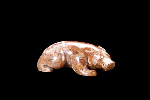 Castle AuctionA Mottled Russet Jade Bear Carving, Han, Circa 2nd C BC–2nd C AD Pr.
