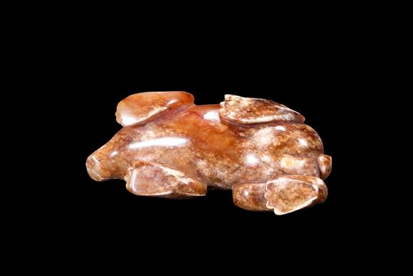 Castle AuctionA Mottled Russet Jade Bear Carving, Han, Circa 2nd C BC–2nd C AD Pr.
