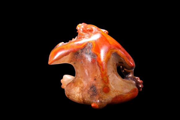 Castle AuctionA Red Agate Crouching Bear Carving, Han, Circa 2nd C BC–2nd C AD Pr.