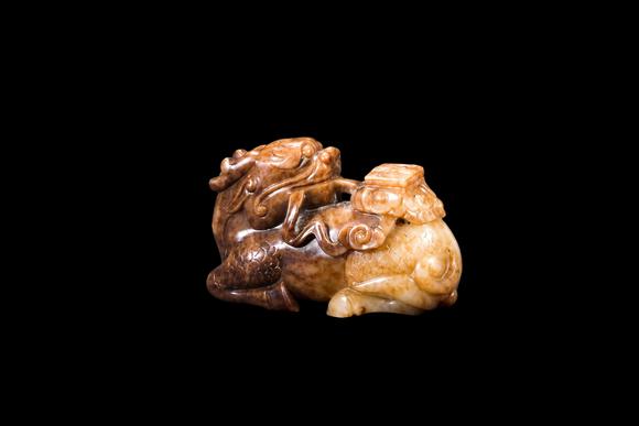 Castle AuctionA Mottled Russet Jade Qilin Carving, Ming, Circa 1368–1644 AD Pr.