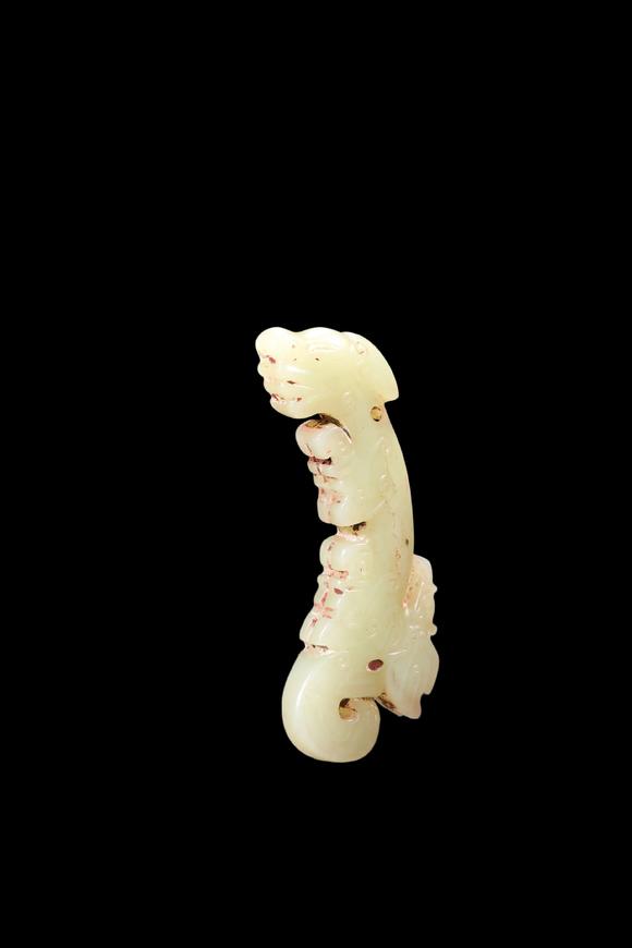 Castle AuctionA Pale Celadon Jade C-Shaped Dragon Pendant, Western Zhou, Circa 10th–9th C BC Pr.