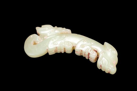 Castle AuctionA Pale Celadon Jade C-Shaped Dragon Pendant, Western Zhou, Circa 10th–9th C BC Pr.