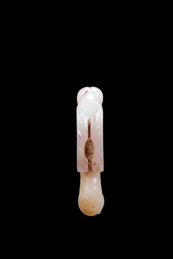 Castle AuctionA White Jade Silkworm Pendant with Russet Veins, Western Zhou, Circa 10th–8th C BC Pr.