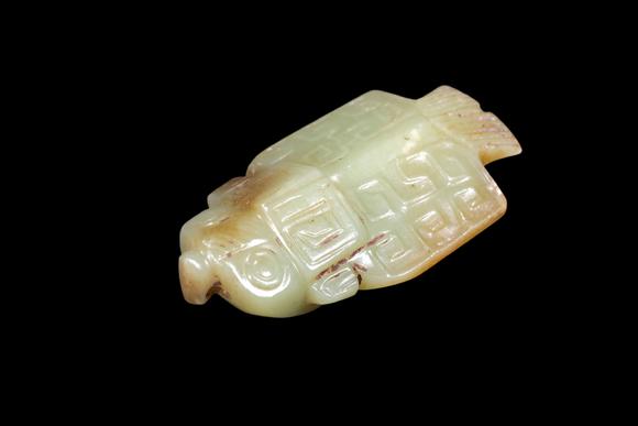 Castle AuctionA Pale Yellow Jade Owl Pendant, Late Shang, Circa 12th–11th C BC Pr.