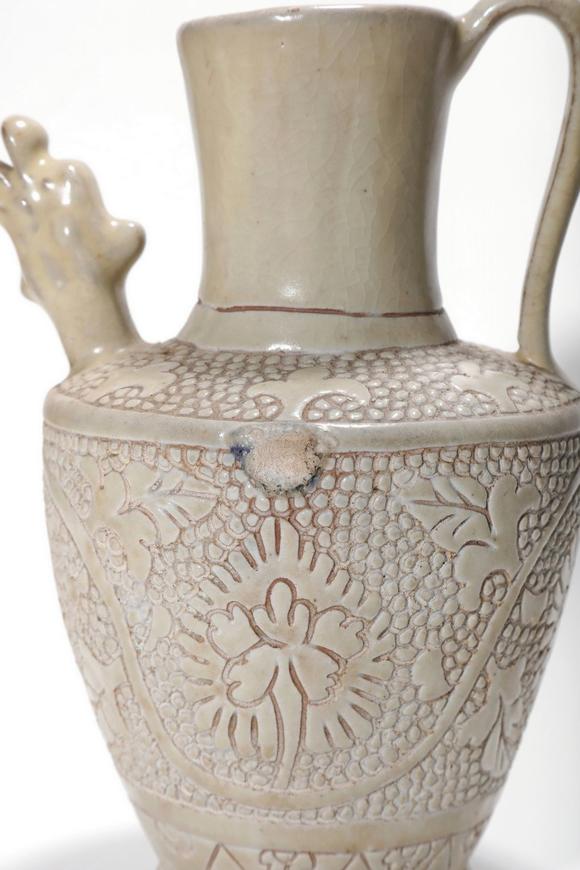 Castle AuctionA Cizhou Kiln Floral Carved Dragon Spout Ewer, 12th–13th C Pr.