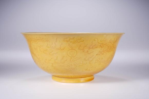 Cascade'sDark carved sea dragon bowl with yellow glaze in Guangxu of Qing Dynasty | 清光緒 黃釉暗刻海水龍紋碗