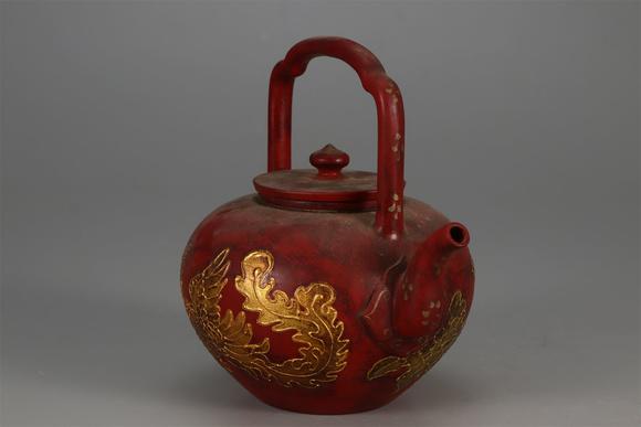 東京國(guó)際拍賣明代 陳用卿 漆器描金鳳紋提梁紫砂壺